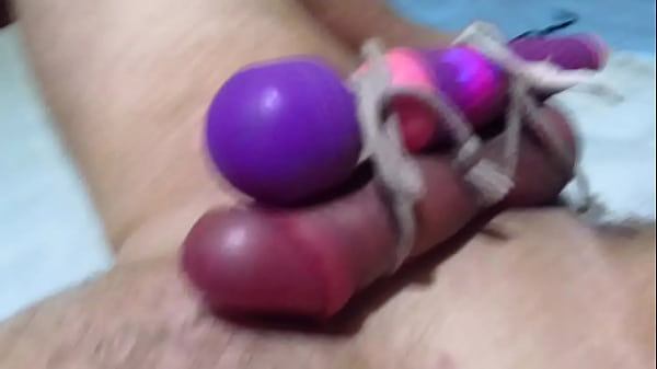 man solo cums from a toy tied to a dick slow motion