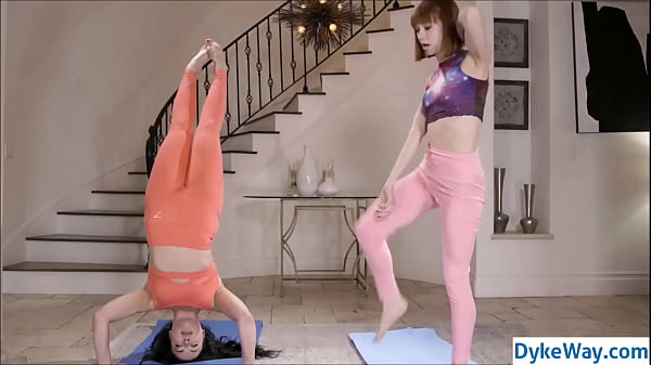 lesbian yoga performed by two flexible girls