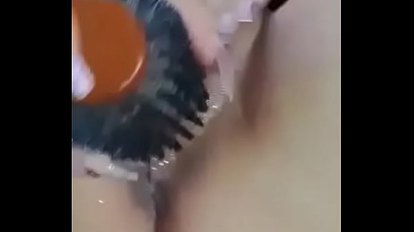 skinny teen masturbating with her hairbrush